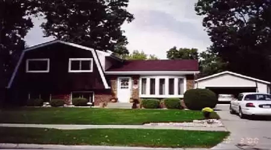 Enjoy great curb appeal on this 3 bedroom - 1 3/4 bath trilevel on a nice tree lined street in Crestwood Trace! New roof and vinyl siding installed in recent years on home and garage!