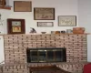 Living Room has a woodburning fireplace.