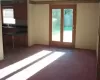 Dining Area off of Kitchen.  With patio door out to rear deck.