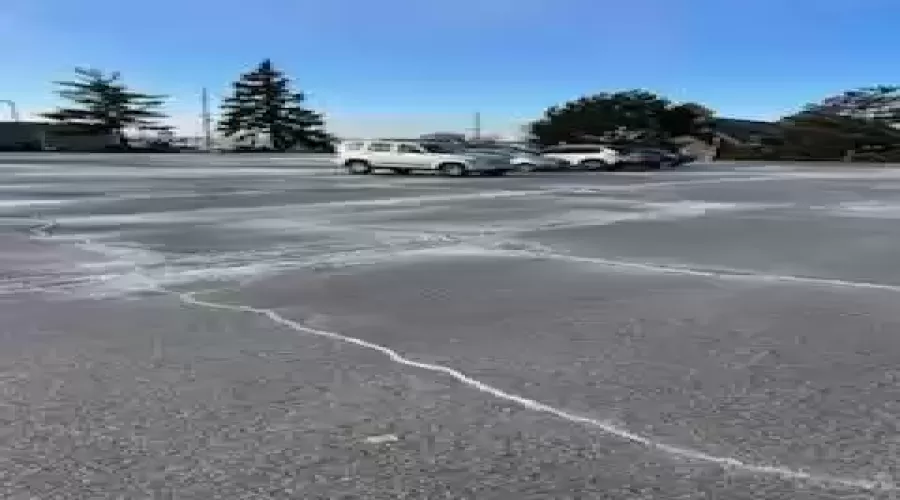 Huge paved parking lot for customers