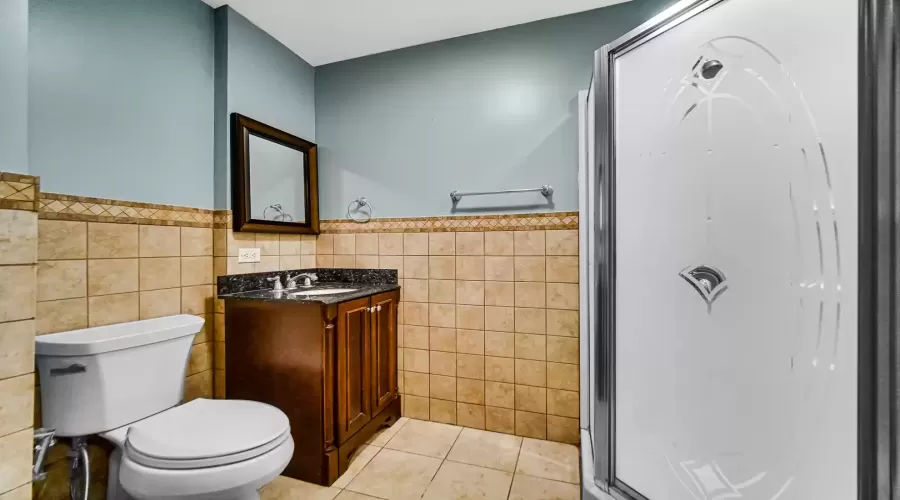 This full bathroom is located on the upper level.