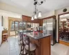 Generously sized kitchen featuring granite counter