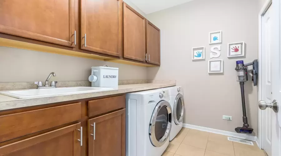 The perfect laundry room.  Plenty of counterspace,