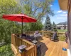 Beautiful private deck overlooks mature trees and