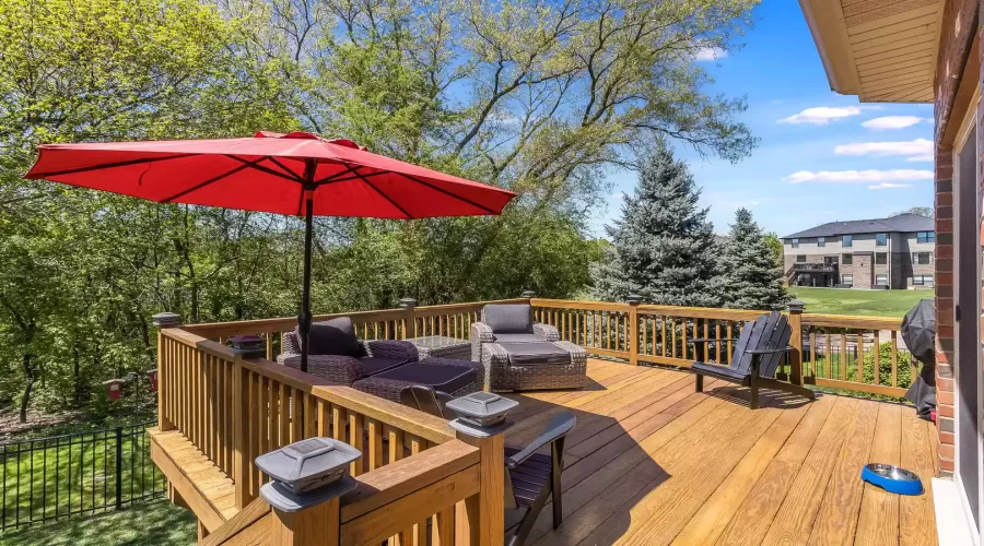 Beautiful private deck overlooks mature trees and