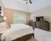 This spacious master bedroom has transom windows,