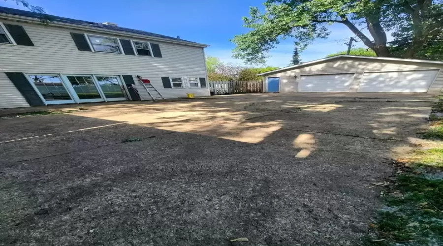 Back of the house, deck, with built in benches