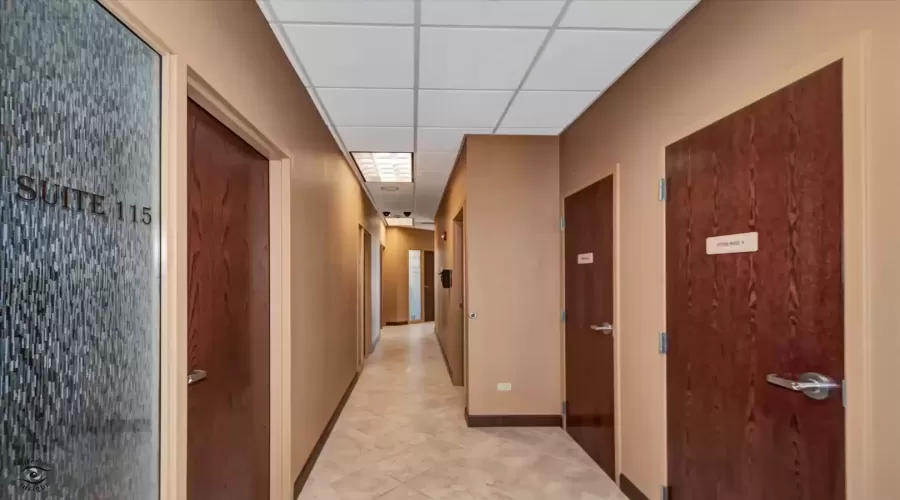 Hallway with storage closets