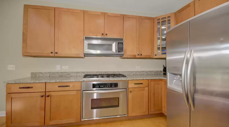 Beautiful kitchen with maple cabinets, granite top