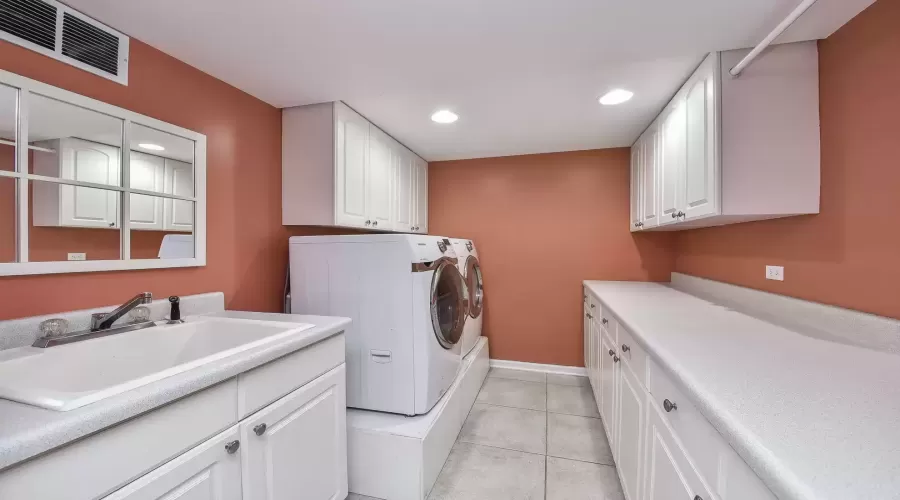 Fully outfitted laundry room creates the ideal pre