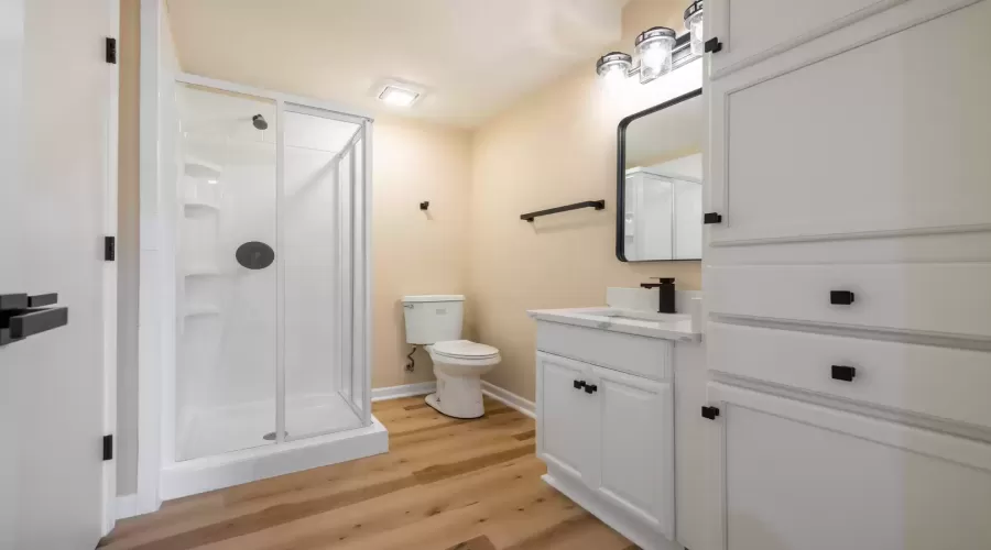 Light and bright! This bathroom features a clean d