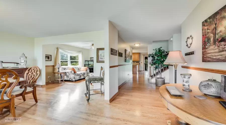 Family room has a wall of windows to give views to