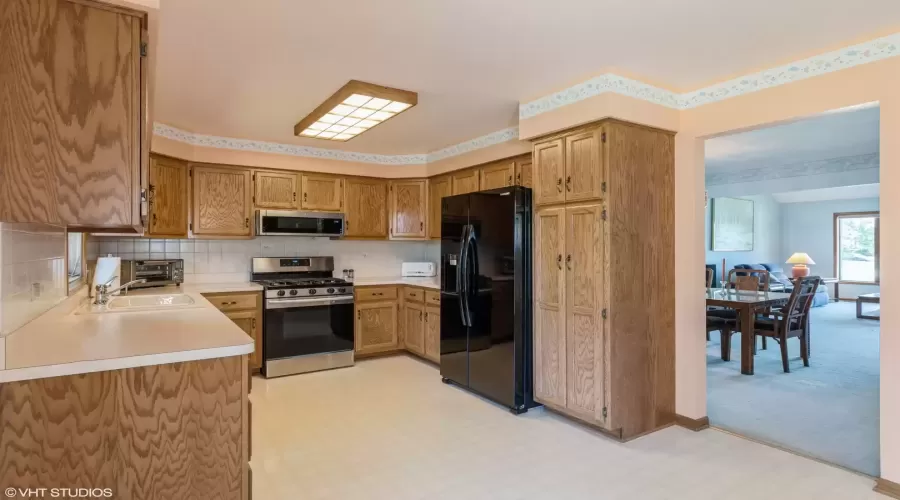 There's a cabinet pantry, kitchen window (out of s