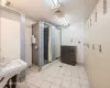 Bathroom w/2 Shower Stalls and 8 Lockers