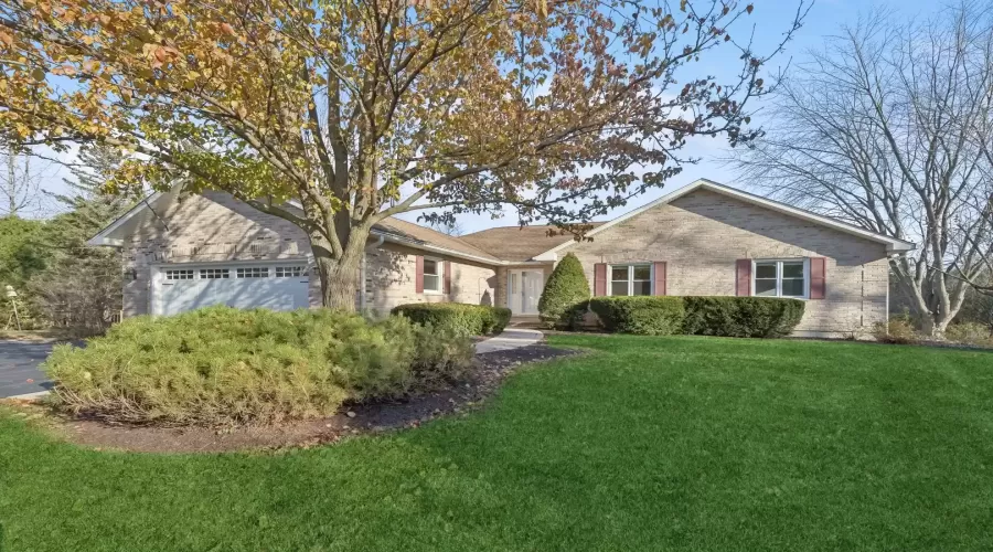 Brick facade; professionally landscaped yard